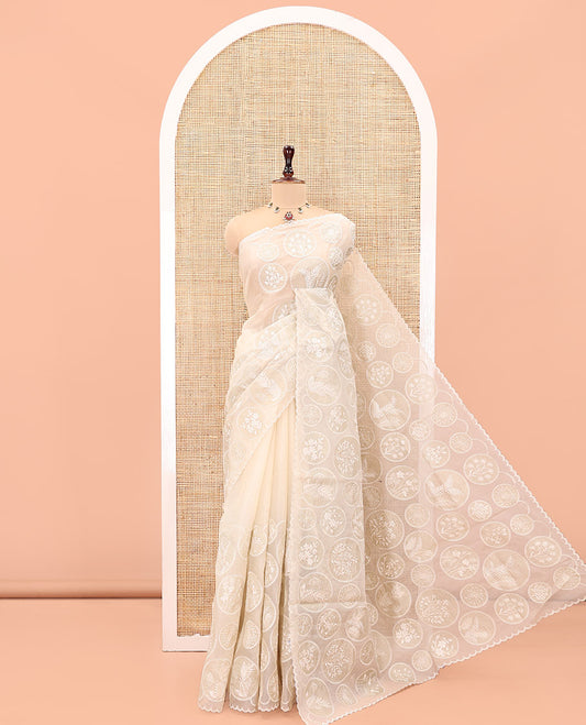Off-White Organza Saree, Delicately decked Up with Floral Enclosed Circle Motifs Thread Embroidery, Subtle Scallop Border, Delicately Embroidered Pallu, and Paired with a Matching Embroidered Blouse