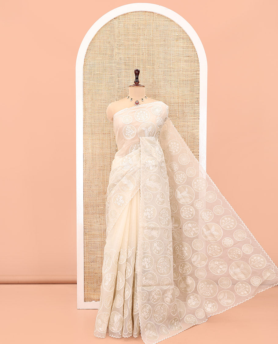 Off-White Organza Saree, Delicately decked Up with Floral Enclosed Circle Motifs Thread Embroidery, Subtle Scallop Border, Delicately Embroidered Pallu, and Paired with a Matching Embroidered Blouse