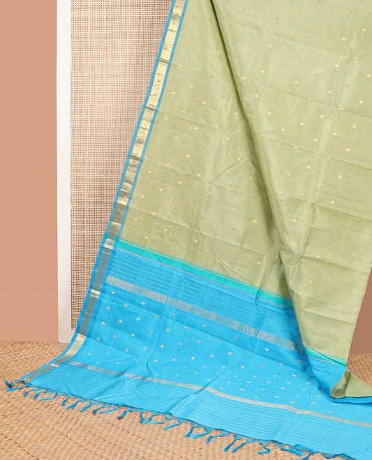 Green floral design kancheepuram silk saree with contrast floral design border & intricate zari desogn pallu