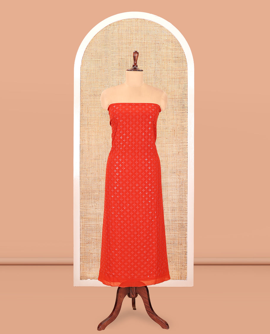 Rust Georgette Material Churidar, Woven with Sequins Embroidered Top, a Matching Bottom, and Embroidered Dupatta