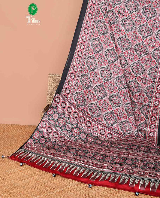 Bordeless black and red red all over ajrack printed design semi-modal silk saree with ajrack printed rich pallu, junjam & printed blouse