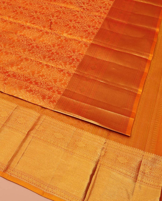 Rust Kanchipuram Wedding Silk Saree, Subtly Sparkled With Jacquard Design On Its Body, Highlighted by Zari Border of Thilakam Mokku, Diamond, and Muthu Designs, Grand Pallu and Paired with a Matching Blouse