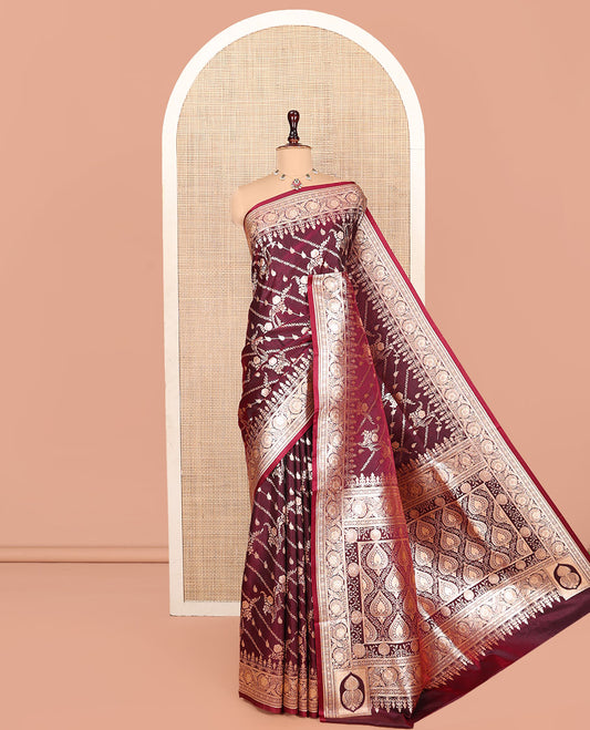 Wine Banarasi Nylon Saree, Prettified with Zari Designs, Highlighted by a Floral Creeper Zari Border, Intricate Pallu, and a Matching Blouse