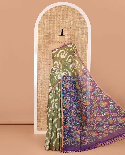 Borderless olive green shibori printed linen cotton saree, contrast kaleidoscope colored kalamkari floral vine print, and a contrast printed blouse