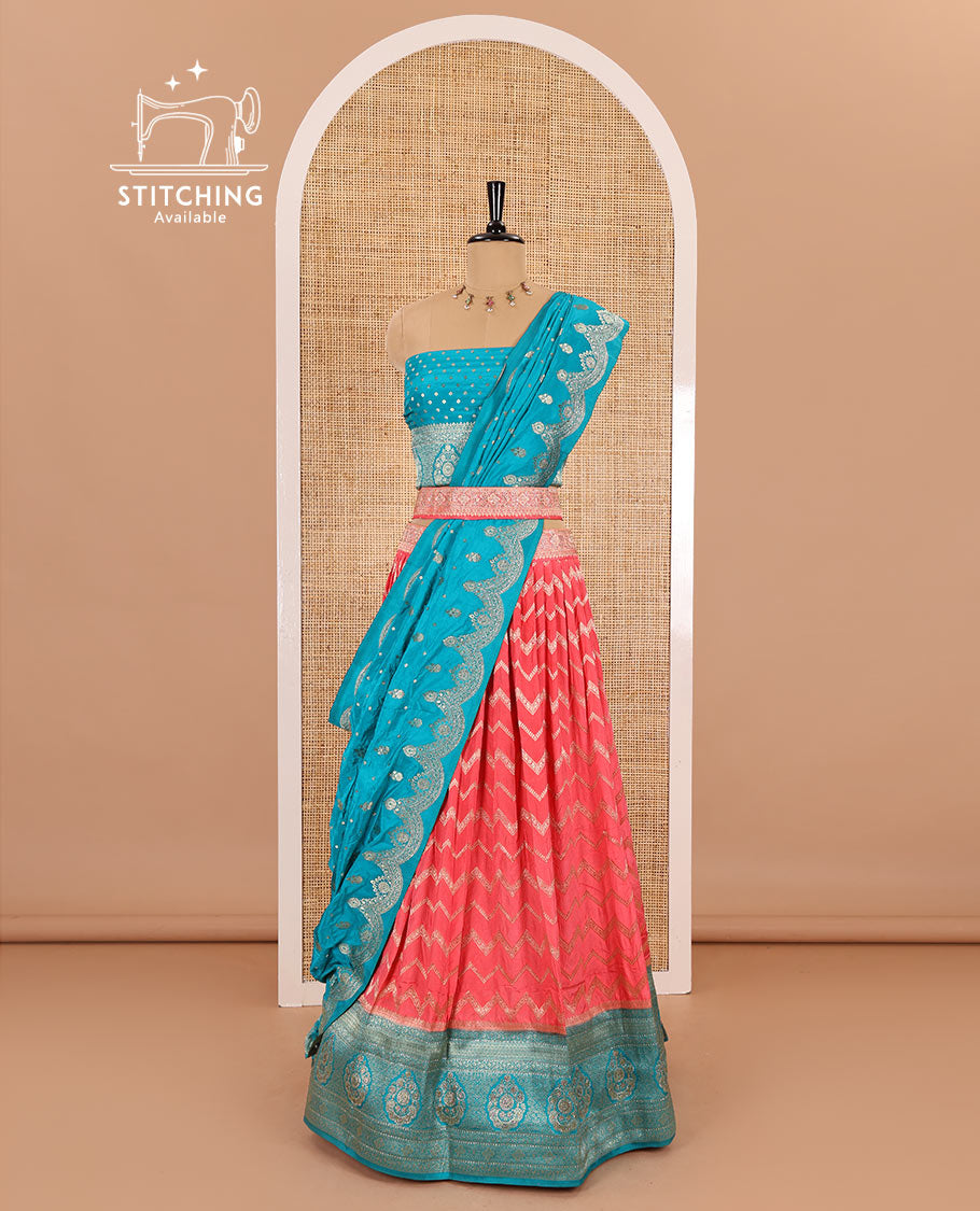 Magenta chiniya crepe half-saree,  chevron zari jacquard with contrast intricate patterned stone work bordered skirt, contrast blouse, and a scallop bordered intricate dhavani