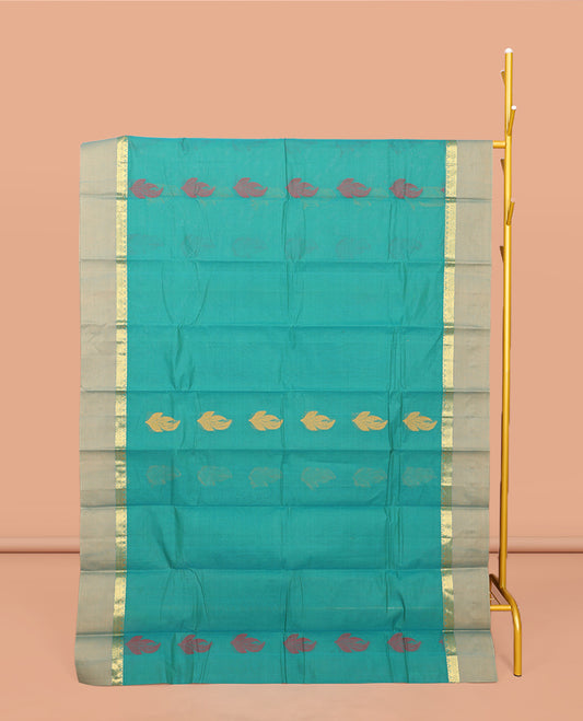 Green Kanchi Cotton Saree, Elevated with Buttas All Over Its Body, Complemented by a Contrast Border, Pallu of Intricate Design, and Paired with a Matching Blouse