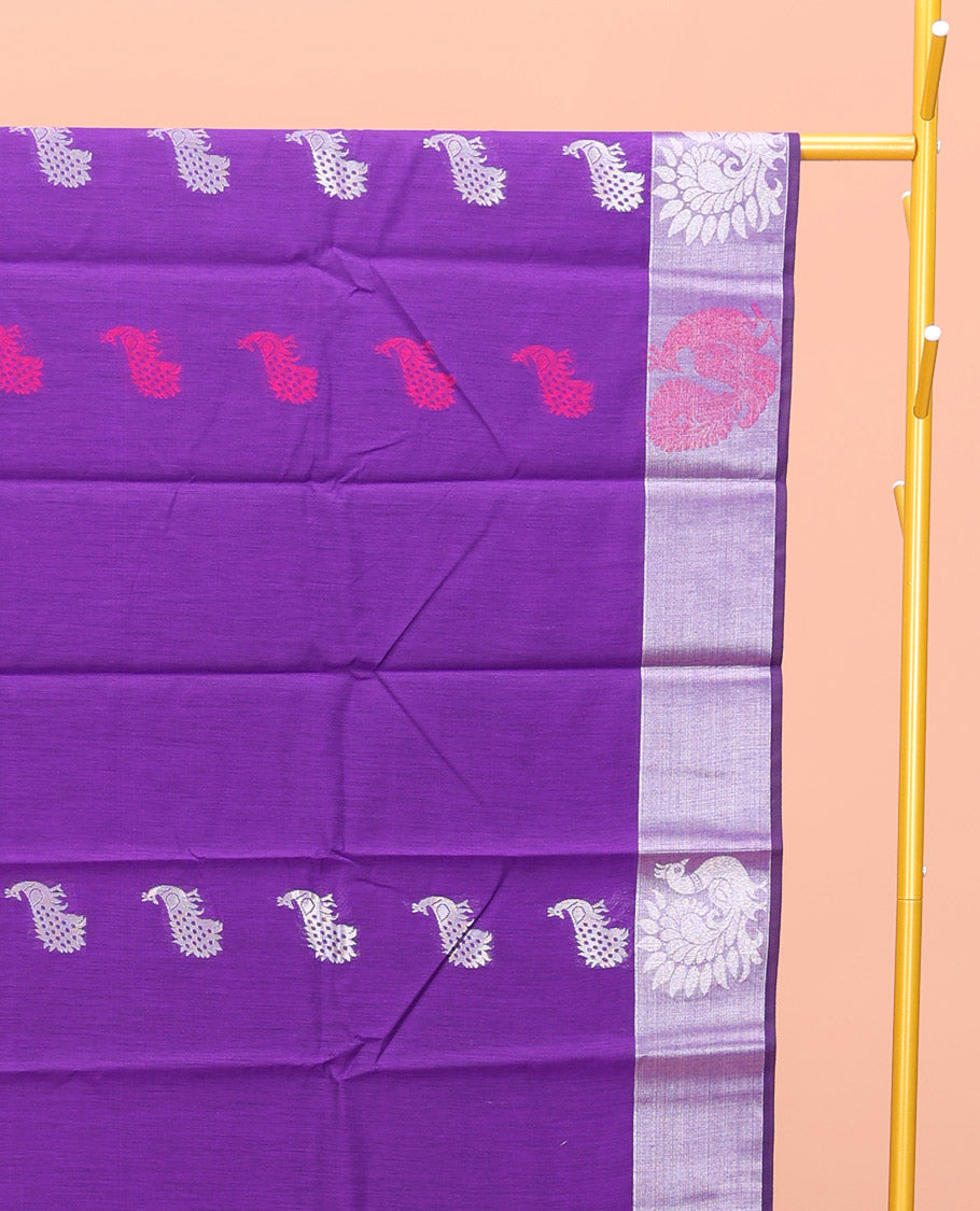 Violet Semi-Silk Cotton Saree, Embellished with Peacock Buttas All Over Its Body, Complemented by a Contrast Border of Peacock Designs, Pallu Steeped with Peacock Zari Design, and Paired with a Matching Blouse