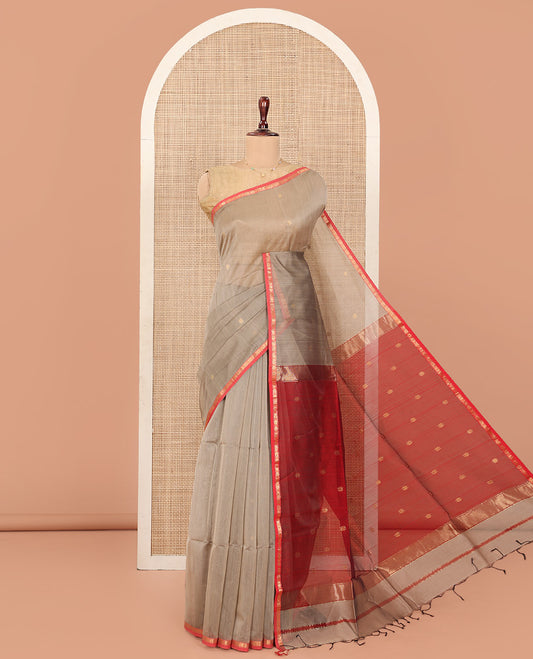 Grey Maheshwari Cotton Saree, Subtly Enriched with Star Buttas All Over Its Body, Contrast Zari Piping Star Buttas Border, Captivating Contrast Pallu Steeped with Star Buttas, and Paired with a Contrast Blouse
