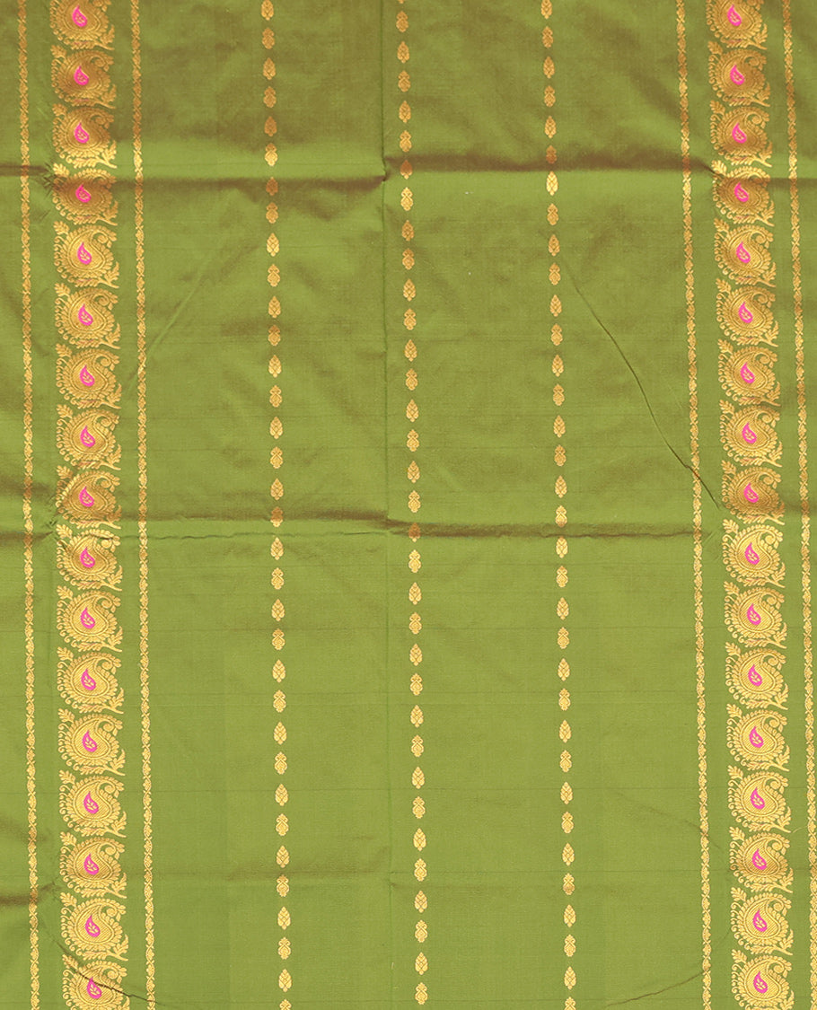 Green Art Silk Pavadai Material Set Featuring Zari Designs on Its Skirt, Complemented by a Contrast Traditional Zari Border, and a Matching Blouse