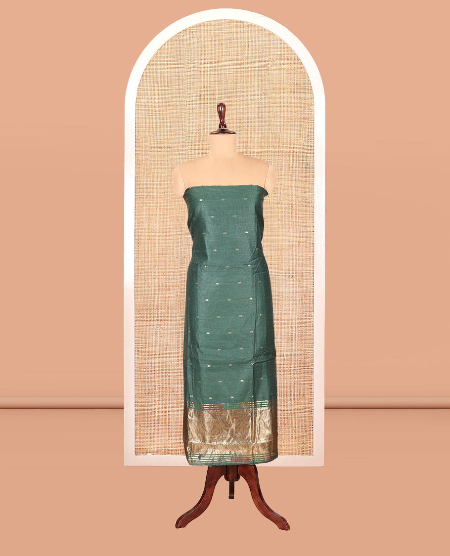 Green Banarasi Chanderi Material Churidar Features Zari Buttas Top, a Plain Bottom, and a Matching Dupatta