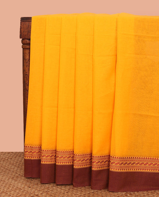 Orange Plain Khadi Cotton Saree, Complemented by a Contrast Traditional Motifs Thread Woven Border, Pallu Features Stripes, and Comes Without a Blouse