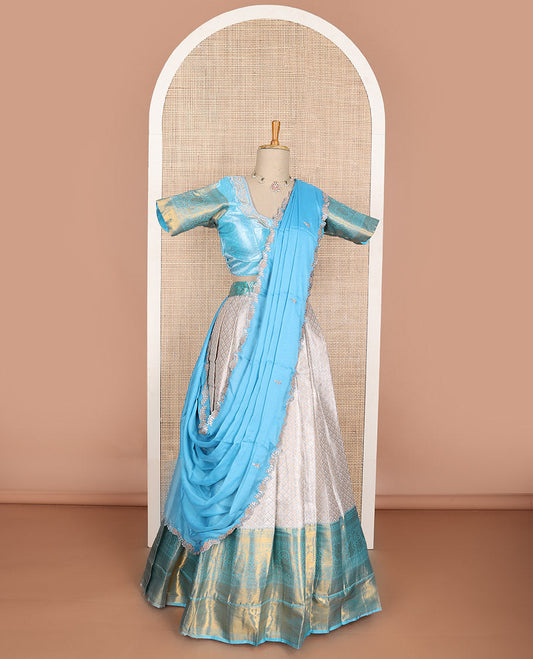 Beige geometric design art silk half saree with contrast zari design border, embroidered blouse & floral embroidery dhavani
