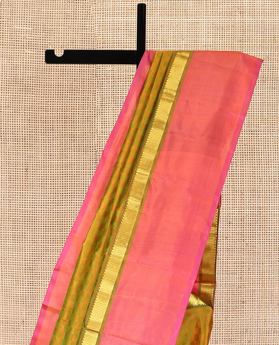 Green-Mustard Kanchipuram Silk Saree, Sparsely Woven with Paiyaadi Kattam on Its Body, Complemented by Contrast Kal Eragina Border of Rekku, and Vanki Designs, Zari-Striped Pallu, and Paired with a Contrast Blouse