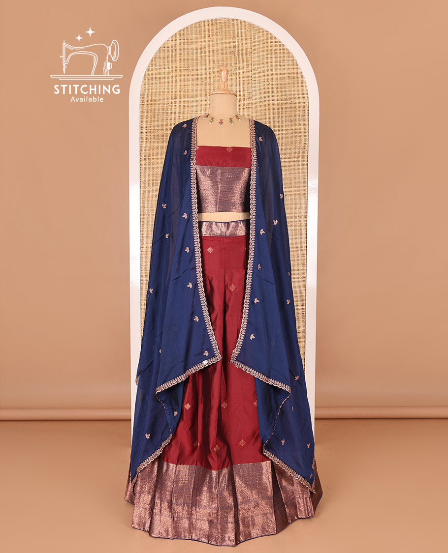 Maroon taffeta silk half-saree, zari buttas and contrast traditional zari bordered skirt, a matching taffeta silk blouse, and contrast embroidered satin georgette  dhavani