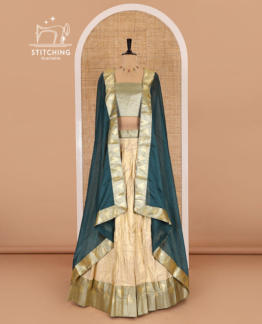 Chikku and rama color half-saree, zari checked with contrast traditional zari bordered banarasi skirt, jacquard blouse, and a contrast zari bordered syska georgette dhavani