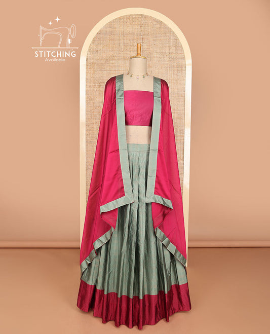 Grey checked half saree with contrast border, plain blouse & plain dhavani