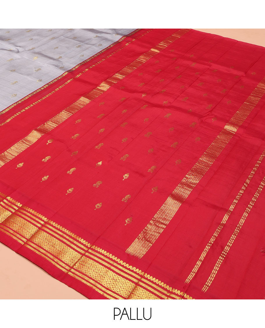 Grey Kanchipuram Silk Saree, Subtly Sparkled with Zari Buttas on Its Body, Complemented by a Contrast One-Sided Korvai Border of Salngai, Banaras, and Jaal Designs, Pallu Features Zari Designs, and Comes Without a Blouse