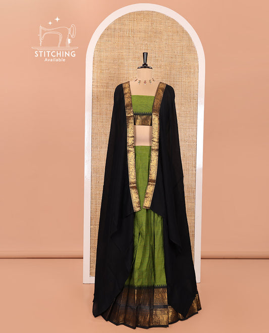 Green and Black Chettinad Cotton Half-Saree Featuring Plain Skirt, Complemented by Contrast Rettai Pettu Traditional Border of Peacock and Elephant Designs, Paired with a Matching Blouse, and a Satin Georgette Zari Bordered Dhavani
