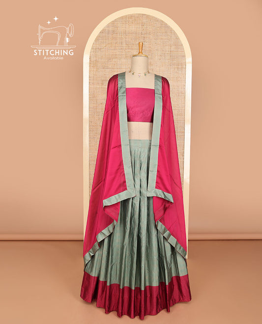 Grey checked half saree with contrast border, plain blouse & plain dhavani