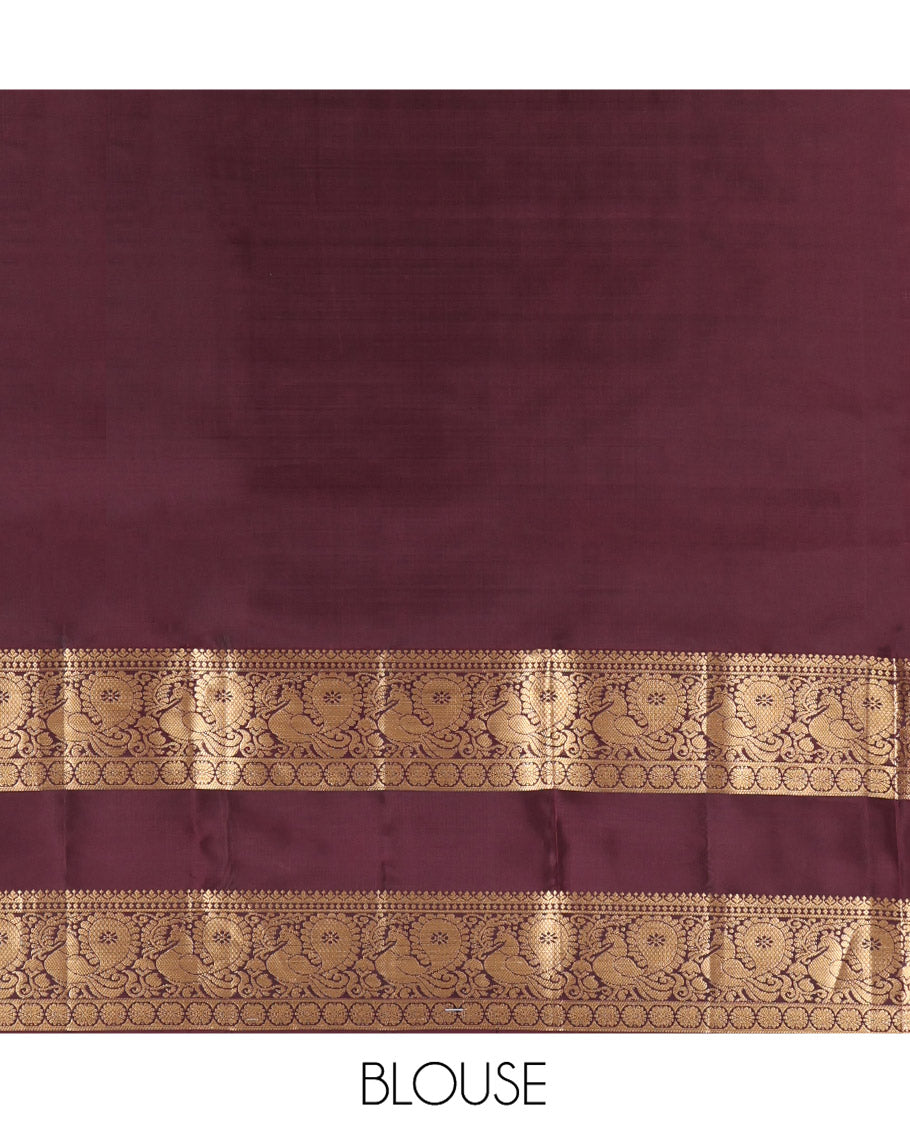 Green Vasundhara Lite Silk Mix Saree, Finely Crafted with Zari Buttas on Its Body, Complemented by Contrast Rettai Pettu Border of Mayil and Laddu Kamalam Designs, Pallu Mirrors the Same Designs, and Paired with a Contrast Blouse