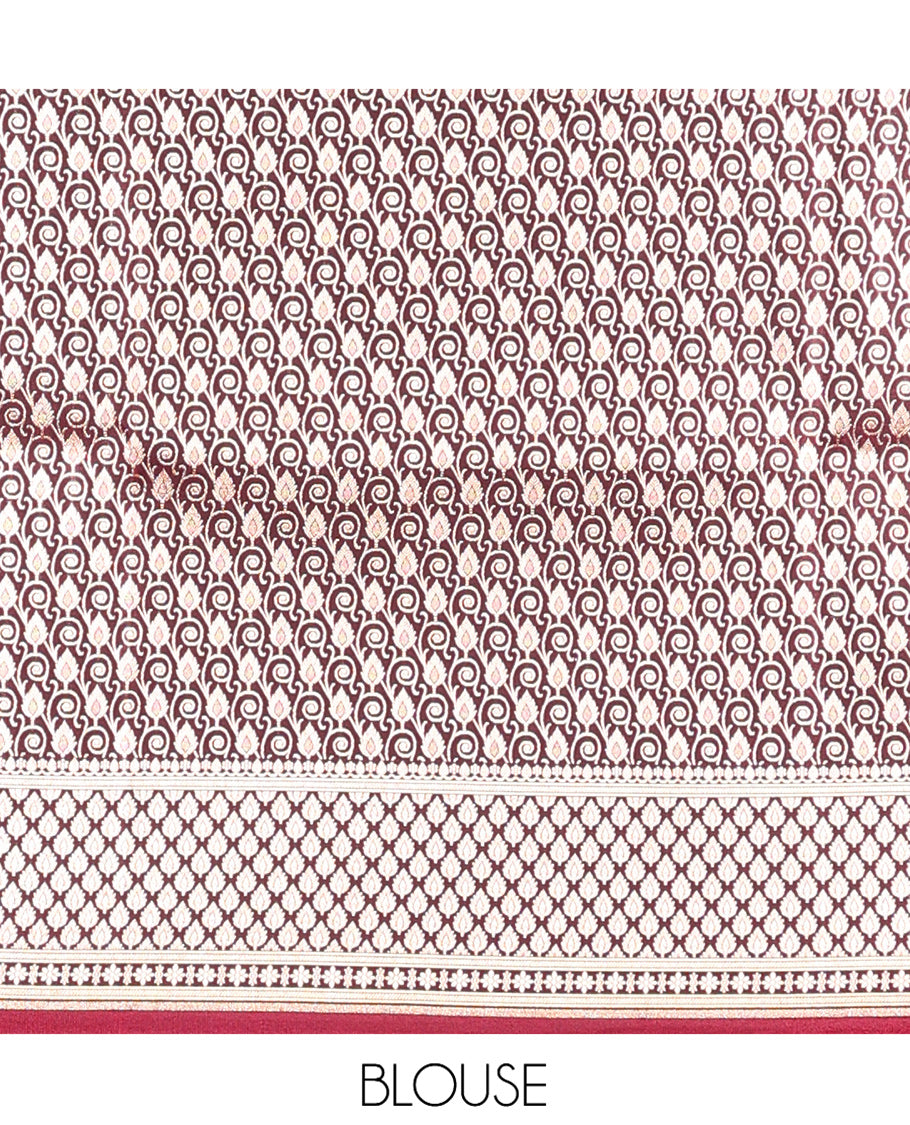 Wine Banarasi Nylon Saree, Prettified with Zari Designs, Highlighted by a Floral Creeper Zari Border, Intricate Pallu, and a Matching Blouse