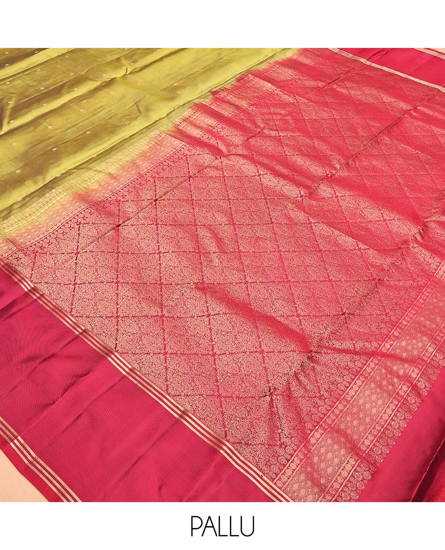 Green Vasundhara Lite-Silk Mix Saree, Beautifully Decorated with Zari Buttas All Over Its Body, Complemented by Contrast Rettai Pettu Border of Zari Stripes, Pallu Accentuated with Jaal Designs, and Paired with a Contrast Blouse