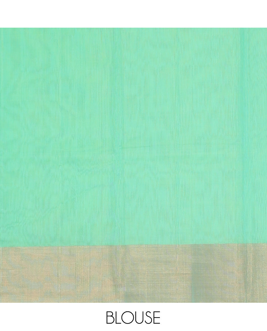 Green Silk Cotton Saree, Graced with Zari Buttas, a Zari Border, Gleaming Zari Pallu, and a Matching Blouse