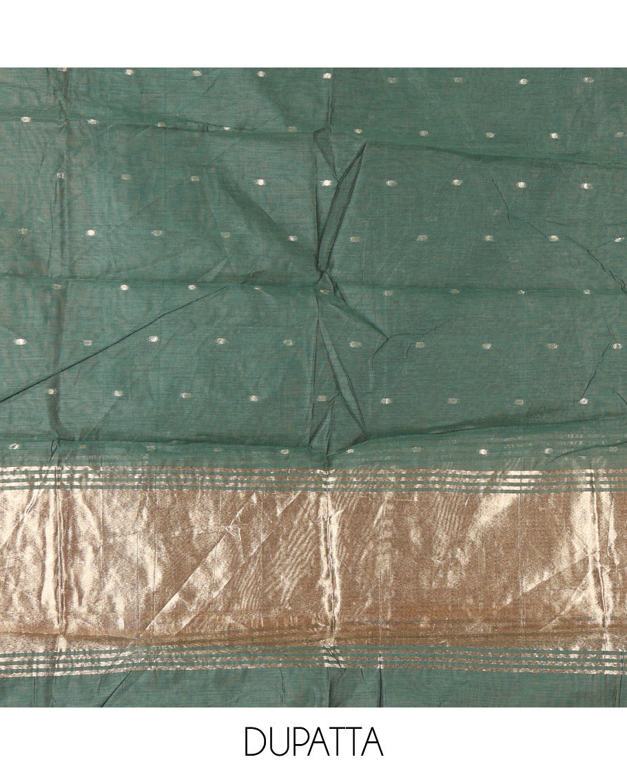 Green Banarasi Chanderi Material Churidar Features Zari Buttas Top, a Plain Bottom, and a Matching Dupatta