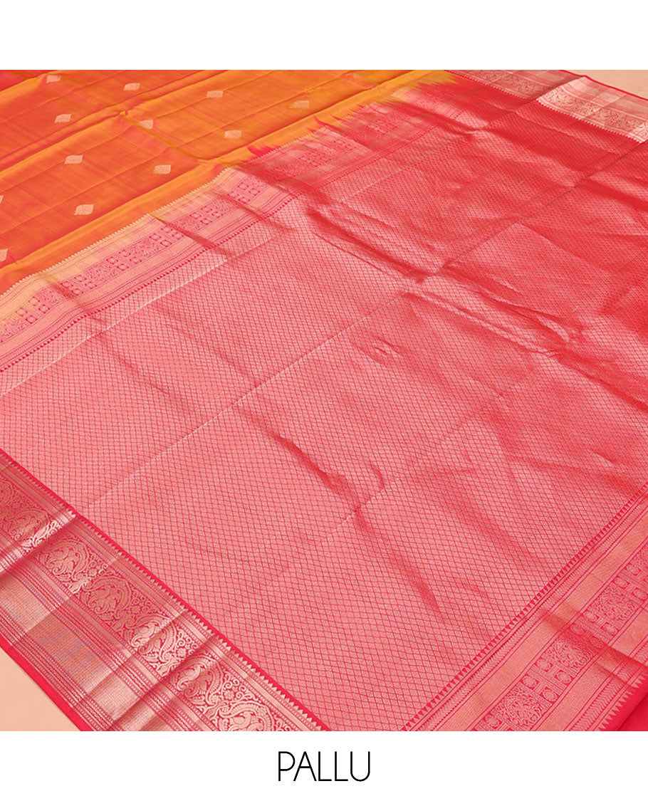 Orange Vasundhara Silk Saree, Sparsely Sparkled with Zari Buttas All Over Its Body, Complemented by a Contrast Border of Rekku, Muthu, Kili, Banaras, Neli, and Mayil Kann Designs, Grand Pallu, and Paired with a Contrast Blouse