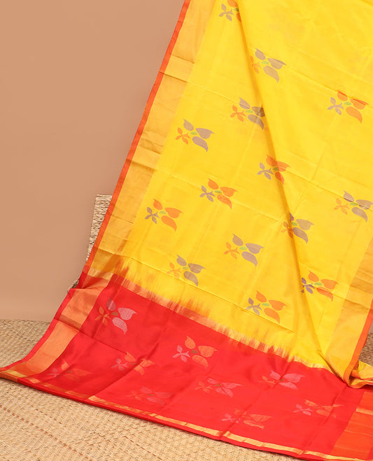 Yellow uppada saree with floral buttas, contrast plain border & pallu of floral designs