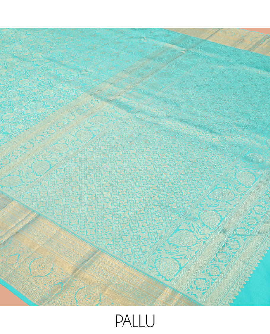 Turquoise Jacquard Kanchipuram Wedding Silk Saree, Highlighted by a Zari Border of Rekku, Muthu, Poun, Kodi Visiry, and Mayil Kann Designs, Grand Pallu, and Matching Blouse