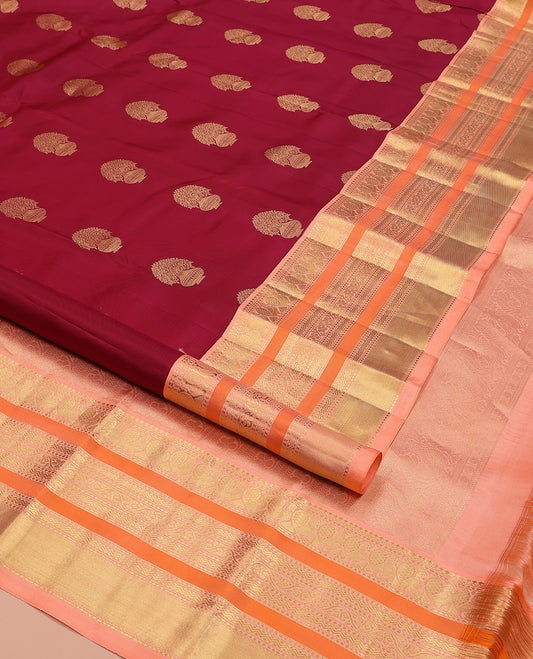 Maroon Vasundhara Silk Saree, Detailed with Floral Zari Buttas All Over Its Body, Complemented by a Contrast Border of Salngai, Mayil, Rettai Neli, and Kodi Visiry Designs, Pallu Steeped with Kodi Visiry Designs, and Paired with a Contrast Blouse