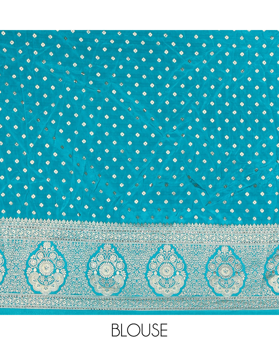 Magenta chiniya crepe half-saree,  chevron zari jacquard with contrast intricate patterned stone work bordered skirt, contrast blouse, and a scallop bordered intricate dhavani