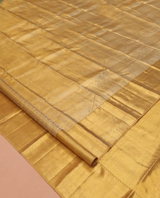 Gold Kanchipuram Tissue Silk Saree, Opulently Embellished with Jacquard Designs on Its Body, Highlighted by a Zari Border of Traditional Designs, Intricately Designed Pallu, and Paired with a Matching Blouse