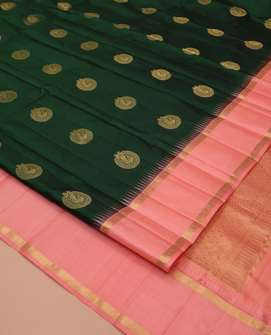 Green Vasundhara Silk Saree, Finely Crafted with Round Mayil Buttas All Over Its Body, Complemented by a Contrast Rettai Pettu Temple Border of Zari Designs, Grand Jaal Pallu, and Paired with a Contrast Blouse