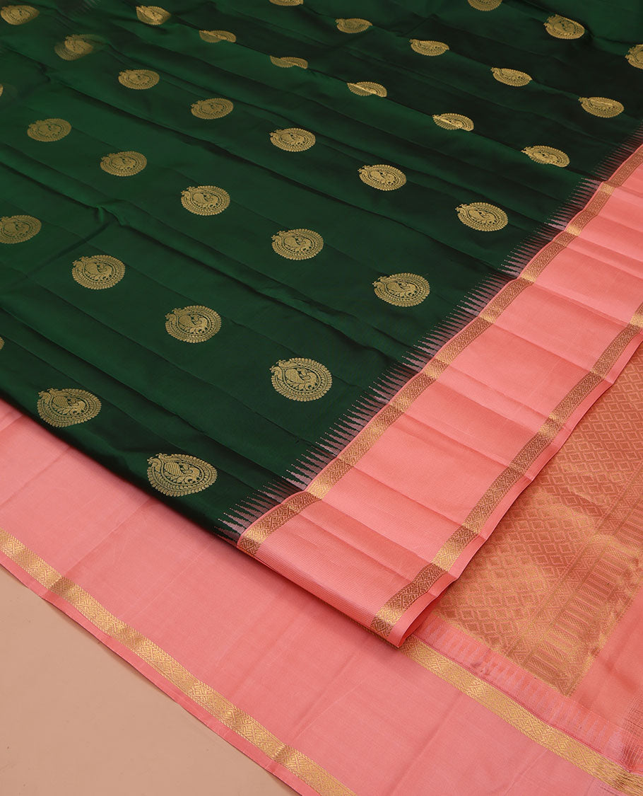 Green Vasundhara Silk Saree, Finely Crafted with Round Mayil Buttas All Over Its Body, Complemented by a Contrast Rettai Pettu Temple Border of Zari Designs, Grand Jaal Pallu, and Paired with a Contrast Blouse