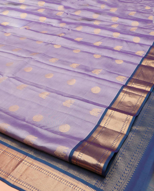 Lavender Vasundhara Lite Silk Mix Saree, Spotlighted with Zari Buttas on Its Body, Complemented by a Contrast Border of Thilakam, Muthu, Mayil Kann, Neli, and Manga Designs, Grandly Woven Pallu, and Paired with a Contrast Blouse