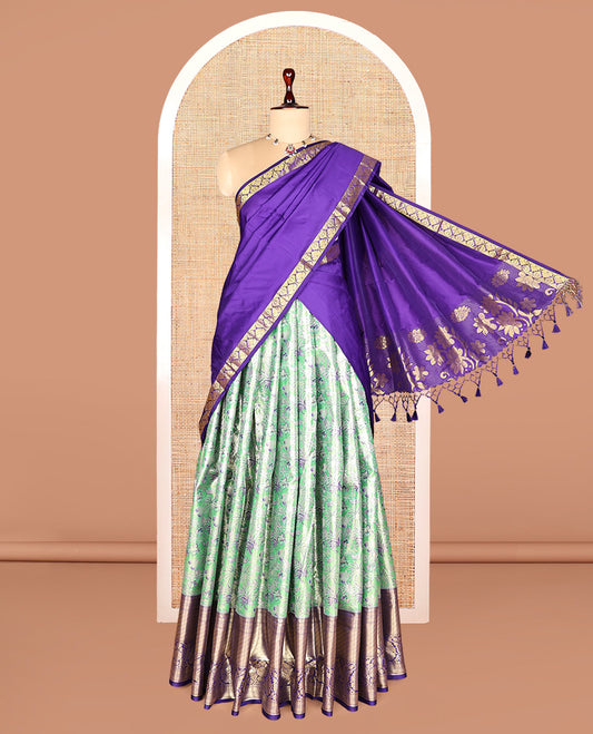 Green Art Silk Half-Saree, Spotlighted with Jacquard Design, Contrast Traditional Zari Border, Paired with a Contrast Jacquard Blouse, and an Intricate Dhavani