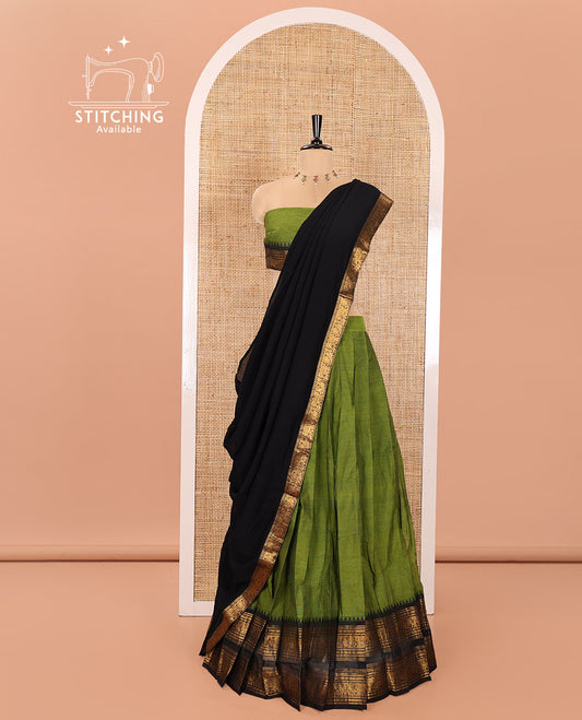 Green and Black Chettinad Cotton Half-Saree Featuring Plain Skirt, Complemented by Contrast Rettai Pettu Traditional Border of Peacock and Elephant Designs, Paired with a Matching Blouse, and a Satin Georgette Zari Bordered Dhavani