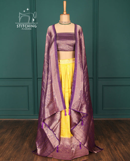 Yellow jacquard art-silk half-saree, contrast traditional zari design border, stonework blouse & intricate dupatta