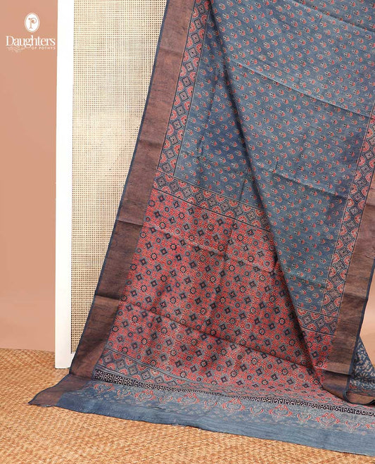 Blue floral motifs tussar silk saree with contrast zari design border & geometric design pallu