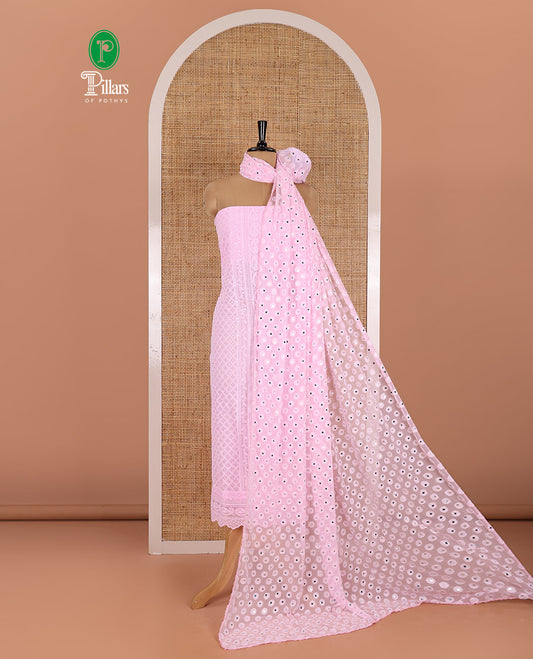 Light pink material chudidar set, paisleys and jaal schiffli sequins embroidered mul georgette top, a matching bottom, and a mirror work dupatta