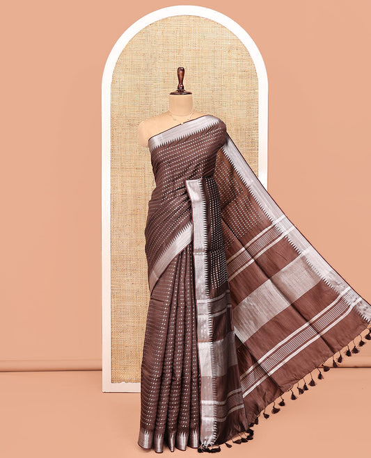 Brown Banana Pith Saree, Richly Detailed with Diamond Buttas All Over Its Body, Subtle Temple Zari Border, Pallu Steeped with Stripes, and Paired with a Matching Blouse