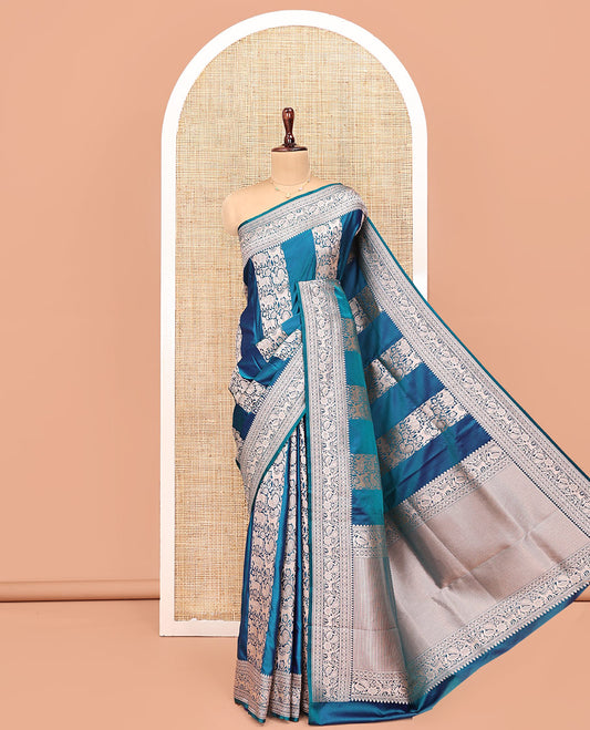 Blue Banarasi Silk Saree, Majestically Detailed with Floral and Animal Motifs on Its Body, Highlighted by a Self-Border of Traditional Designs, Pallu of Stripes, and Paired with a Matching Blouse