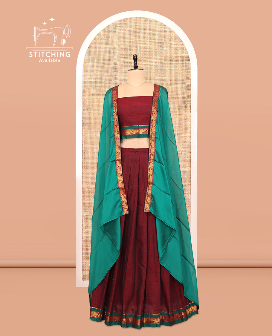 Maroon Cotton Half-Saree Features Plain Skirt, a Contrast Traditional Zari Border, a Matching Blouse, and a Contrast Dhavani