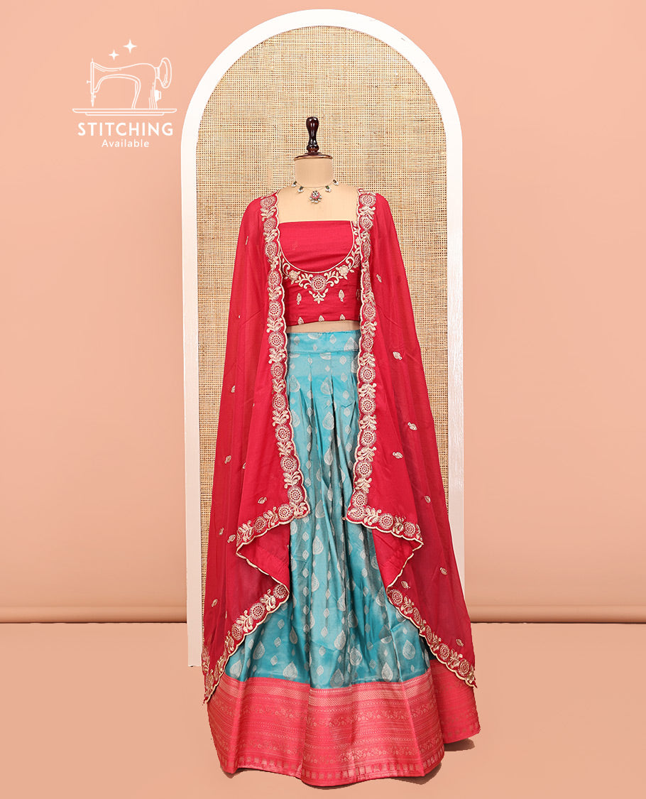 Blue Art Silk Half Saree Features Buttas Woven Skirt, Contrast Traditional Border, an Embroidered Blouse, and Contrast Scallop Embroidered Dhavani