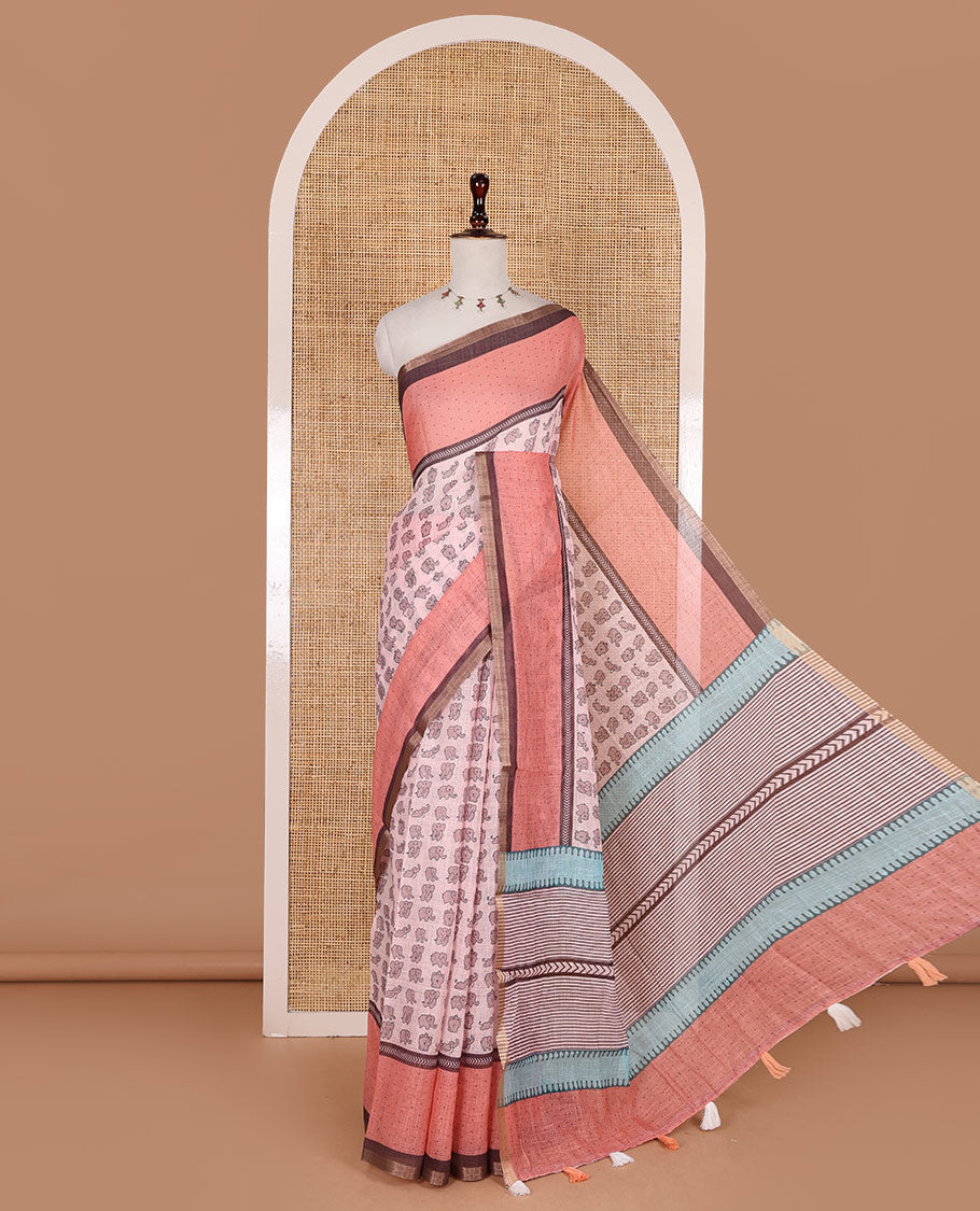 Pastel pink cute elephant motifs printed linen cotton saree, contrast chevron border, pallu of stripes and chevron, and contrast printed blouse
