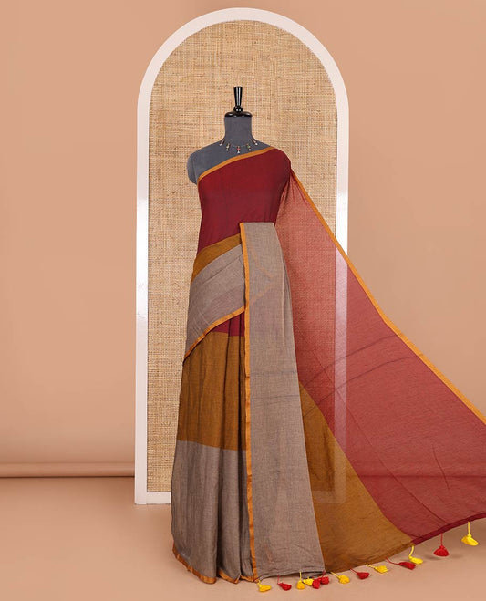 Borderless brown tri-ombre-colored plain khadi mul cotton saree with self-pallu, multi-colored tassels and a matching blouse