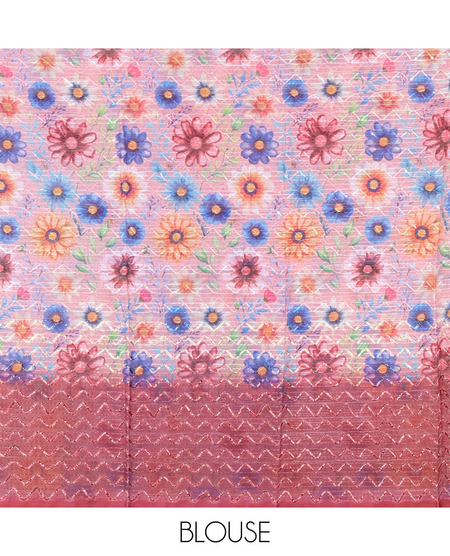 Borderless maroon sparkling glitter russel net saree with self-pallu, and a contrast floral printed and zig-zag patterned blouse