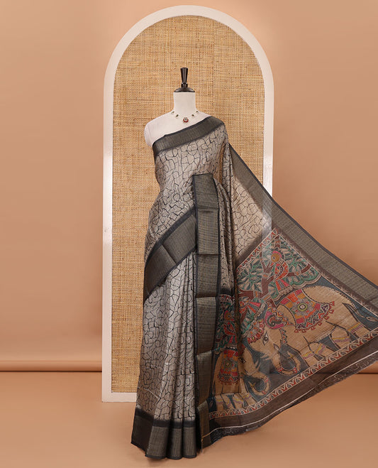 Chikku geometric printed semi-jute saree, contrast geometric zari border, pallu of madhubani elephant & bird print, & black blouse of print & zari work